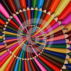 Colorful rainbow sharpen pencils spiral background pattern fractal. Pencils background pattern. School pencils rainbow spiral frac