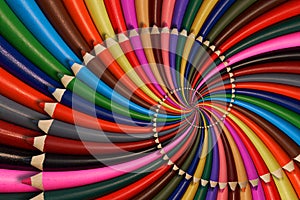 Colorful rainbow sharpen pencils spiral background pattern fractal. Pencils twisted background pattern. Abstract pencils rainbow s photo