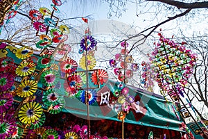 Colorful rainbow toy pinwheels on Spring Festival Temple Fair, during Chinese New Year