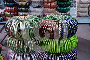 Colorful Rajasthani bangles being sold at famous Sardar Market and Ghanta ghar Clock tower in Jodhpur, Rajasthan,India