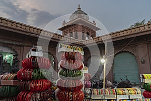 Colorful Rajasthani bangles being sold at famous Sardar Market and Ghanta ghar Clock tower in Jodhpur, Rajasthan, India