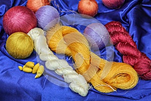 Colorful raw silk thread and silk cocoons.