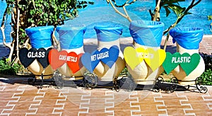 Colorful recycle bins for different types of waste