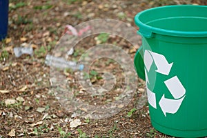 Colorful recycling bin on a ground background. Containers for garbage recycling. Environment, ecology, recycling concept
