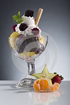 Colorful red berrie sundae decorated for menu card