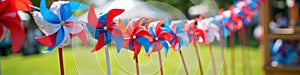 Colorful red and blue pinwheels on a sunny summer day