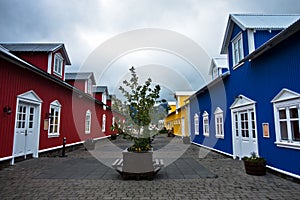 Colorful red, blue and yellow houses at Siglufjordur harbor