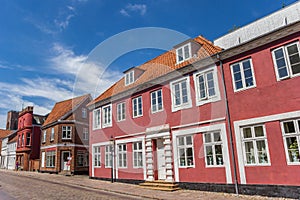 Colorful red facades in the streets of Ribe