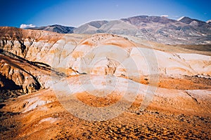 Colorful red hills and canyons in pastel colors