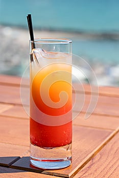Colorful Red Orange Fruits Cold Icy Cocktail Glass