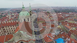 Colorful red roofs, streets of Prague, old city aerial shot