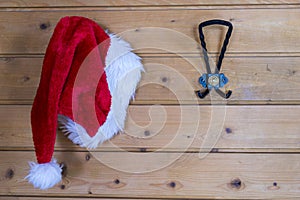 Colorful red Santa Hat hanging on a wall