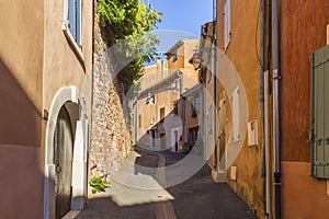 Colorful red streets of Roussillon village in France