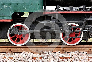 Colorful red and white vintage train wheels