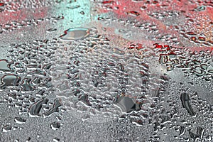 Colorful reflections of lights in the rain