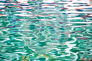 Colorful reflections on sea water - beautiful water background, Caribbean Sea