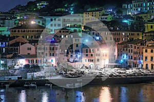 Colorful reflections on the water in Nervi, Genoa