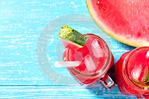 Colorful refreshing drinks for summer, cold watermelon lemonade juice smoothies in the glasses