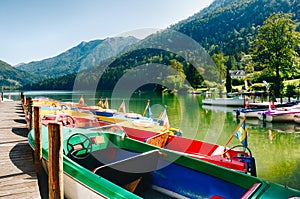 Colorful rental boats on a beautiful idyllic lake