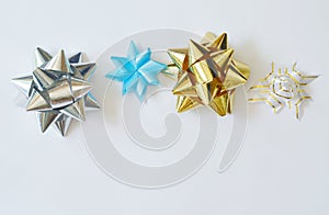 colorful ribbon bow for wrapping gift box on white background