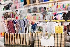 Colorful ribbons on counter in store