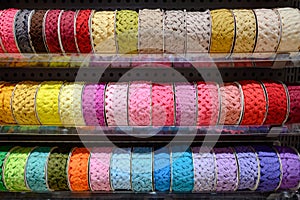 Colorful Ric Rac ribbon on rack in craft shop