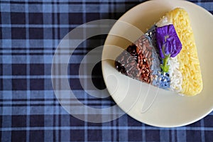 Colorful rice with sesame. brown, red riceberry, yellow safflower, blue butterfly pea, white rice