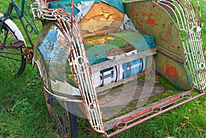 Colorful rickshaw in decay