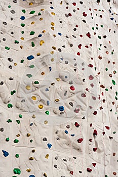 Colorful Rock Climbing Wall with Ropes
