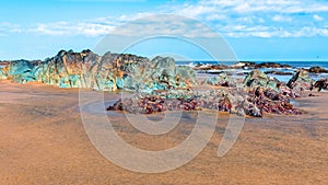 Colorful rock formations at Playa Lagarto, located near Pedasi in Panama