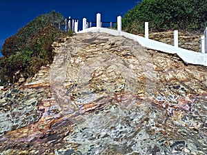 Colorful rock in Vila Nova de Milfontes in Portugal at river Mira