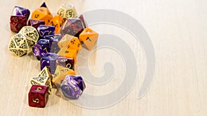 Colorful roleplaying dice scattered on a table