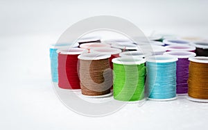 The colorful roll of thread on background,needlework,craft