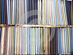 Colorful Rolls of Fabric in Store Display for Selling
