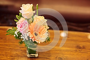 Colorful romantic flower bouquet with on wooden table background. Anniversary, Valentine, Wedding, Proposal, Dating, Surprise, Lov