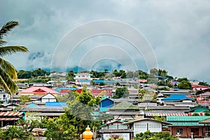 Colorful roofs in the village on the hill.