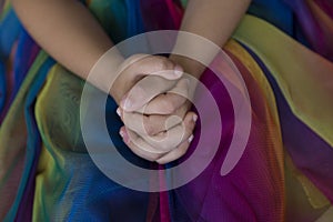 The colorful ropes on the hand on background.