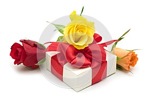 Colorful roses and gift box