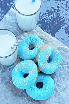 Colorful round donuts on the table