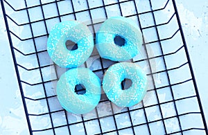 Colorful round donuts on the table