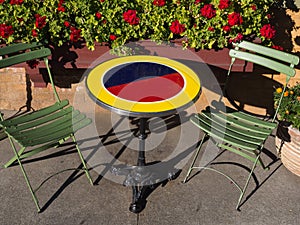 Colorful round table with two chairs