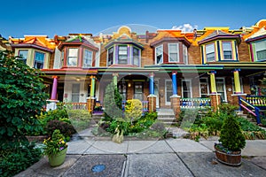 Colorful row houses on Guilford Avenue, in Charles Village, Baltimore, Maryland photo