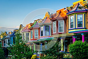 Colorful row houses on Guilford Avenue, in Charles Village, Baltimore, Maryland photo