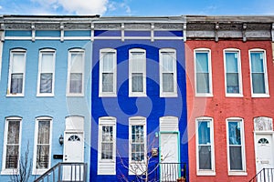 Colorful row houses on Howard Street, in Old Goucher, Baltimore, Maryland photo