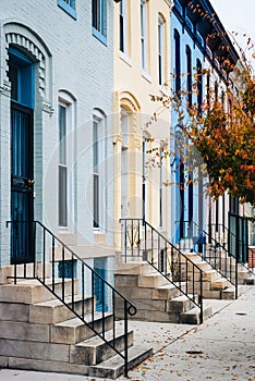 Colorful row houses on 26th Street in Charles Village, Baltimore, Maryland photo