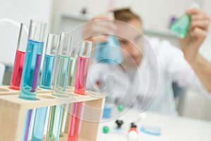 Colorful rows laboratory test tubes  science background