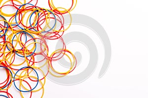 Colorful Rubber Bands arranged on a white background