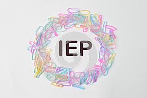 Colorful rubber bands with text IEP stands for Individualized Education Program