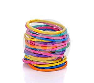 Colorful rubber bands on white