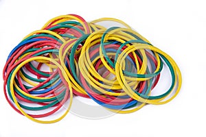 Colorful rubber bands on the white background.
